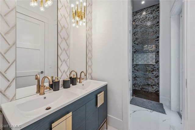 full bathroom featuring marble finish floor, a sink, and double vanity