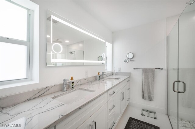 418 Germain Ave, Naples, FL 34108 - bathroom with a stall shower and double vanity