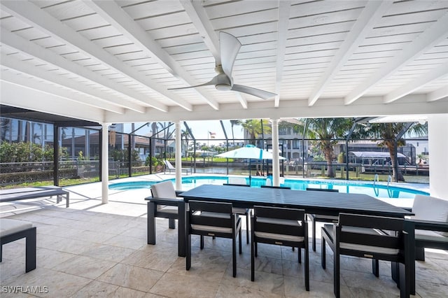 418 Germain Ave, Naples, FL 34108 - swimming pool with glass enclosure, a patio, outdoor dining area, and ceiling fan
