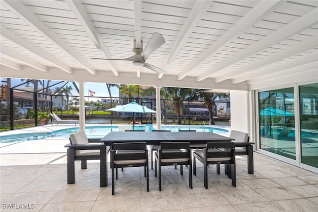 418 Germain Ave, Naples, FL 34108 - view of patio featuring an outdoor pool, outdoor dining area, glass enclosure, and a ceiling fan