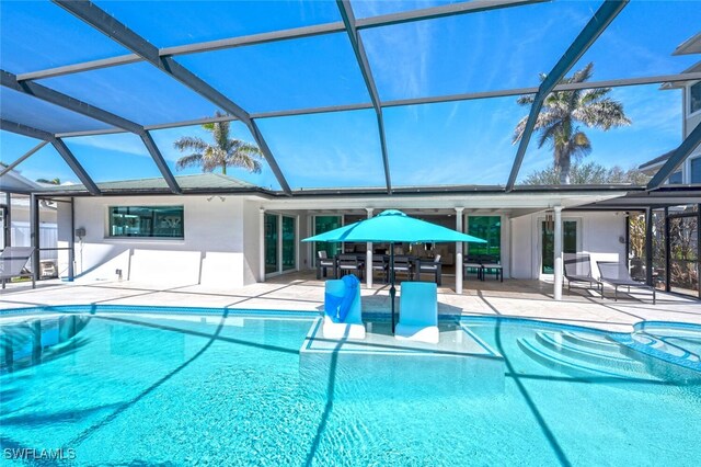 418 Germain Ave, Naples, FL 34108 - outdoor pool with a patio and glass enclosure