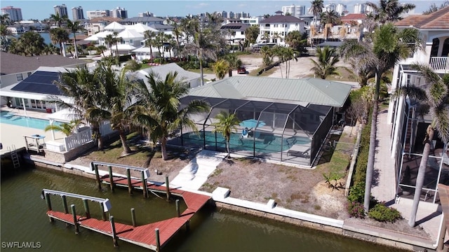 418 Germain Ave, Naples, FL 34108 - aerial perspective of suburban area with a nearby body of water and a pool