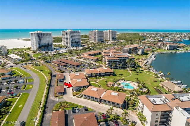 birds eye view of property featuring a water view