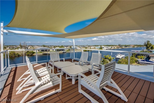 deck featuring a water view