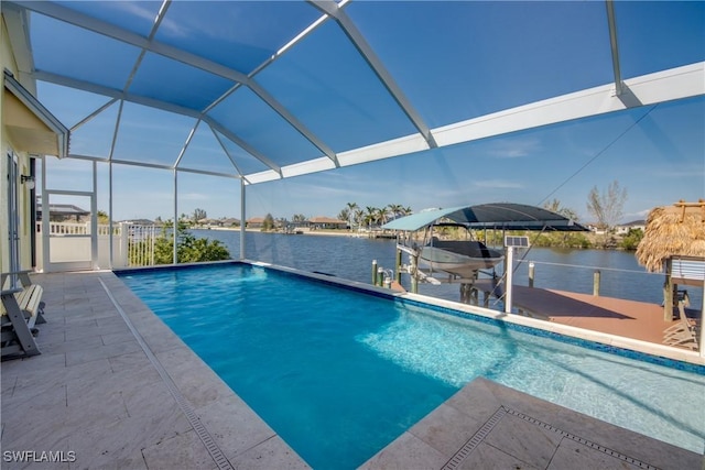 view of swimming pool with a dock, a water view, and a lanai