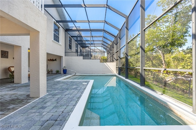 12206 Siesta Dr, Fort Myers Beach, FL 33931 - outdoor pool featuring a patio area and a lanai