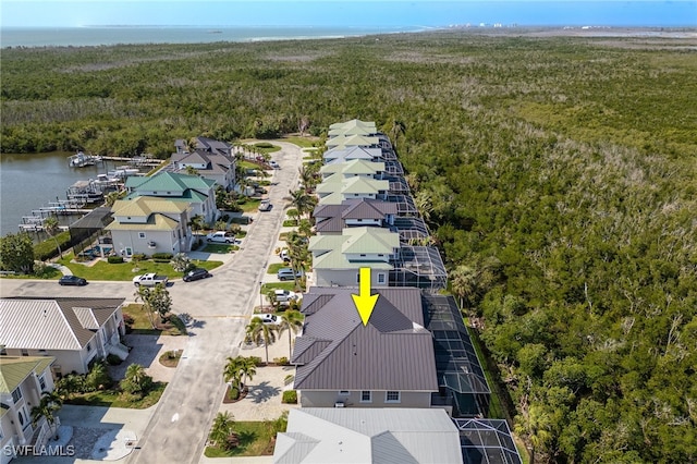 12206 Siesta Dr, Fort Myers Beach, FL 33931 - aerial view of residential area with a heavily wooded area and a nearby body of water