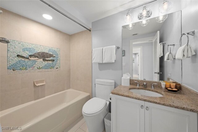 full bathroom with toilet, tile patterned flooring, and vanity