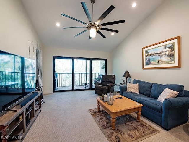 living area featuring high vaulted ceiling, recessed lighting, light colored carpet, and ceiling fan