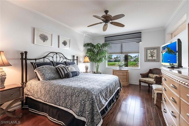 bedroom with ceiling fan, baseboards, ornamental molding, and dark wood-style floors