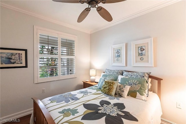 bedroom featuring ceiling fan, baseboards, and crown molding
