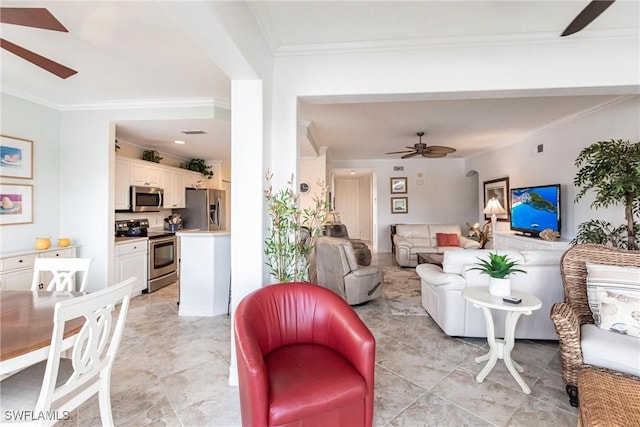 living area with ceiling fan, crown molding, and visible vents