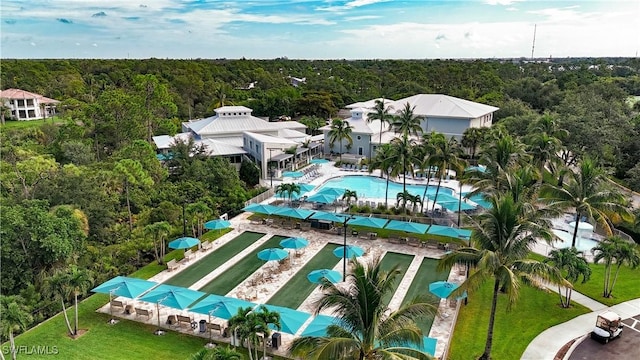 aerial view featuring a wooded view