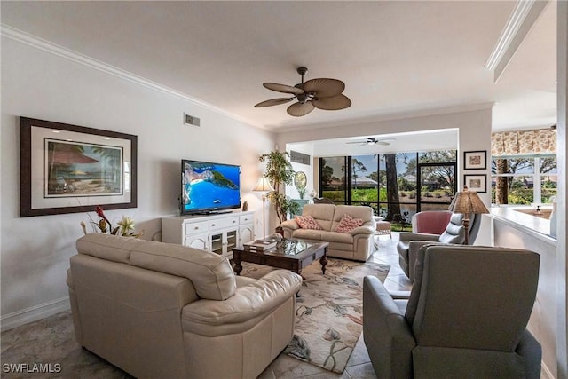 living room with ceiling fan, baseboards, visible vents, and ornamental molding