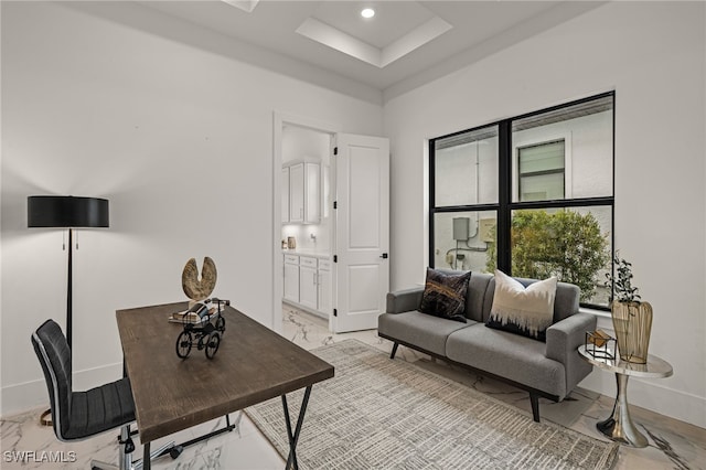 office space with recessed lighting, marble finish floor, and baseboards