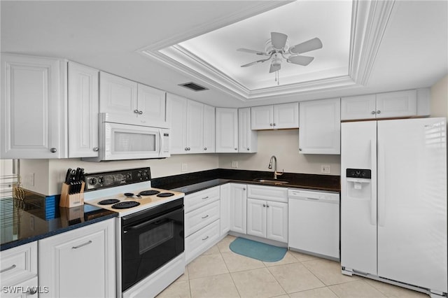 kitchen with sink, crown molding, a raised ceiling, white appliances, and white cabinets