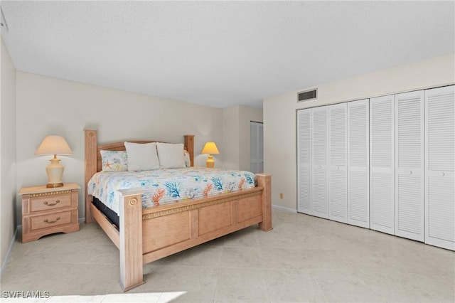 bedroom featuring two closets