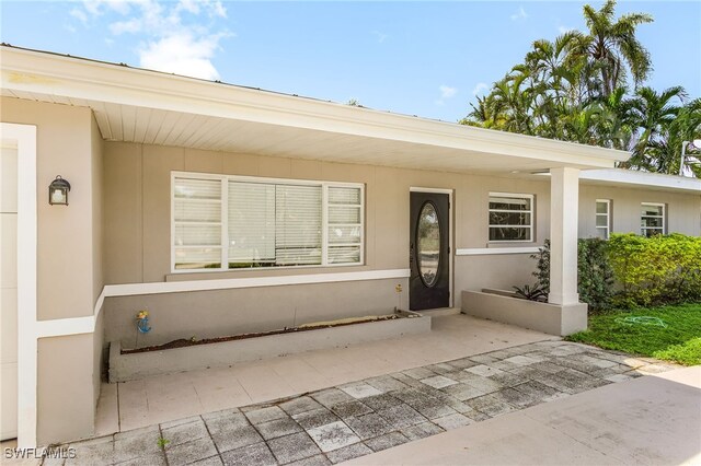 14819 Randolph Ct, Fort Myers, FL 33905 - property entrance featuring stucco siding