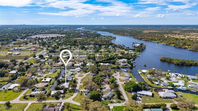 aerial view with a residential view and a water view