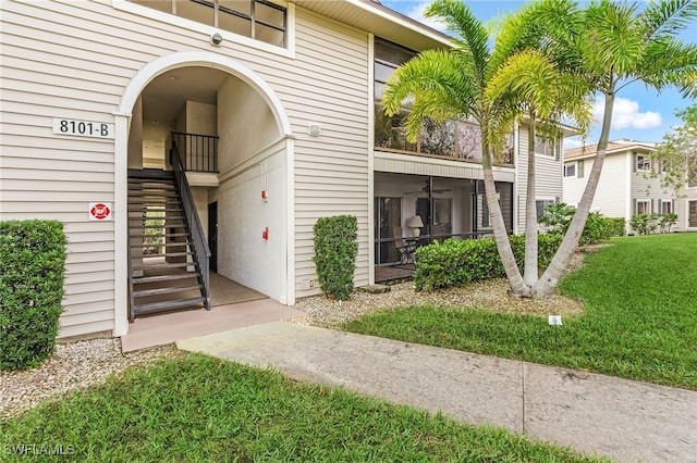 entrance to property with a yard