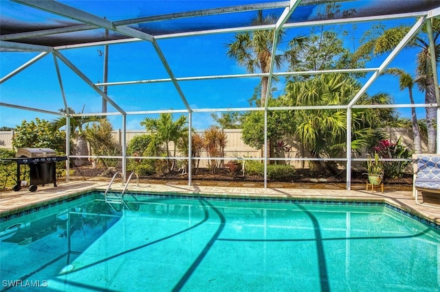 16380 Kelly Woods Dr, Fort Myers, FL 33908 - view of pool with a lanai and grilling area