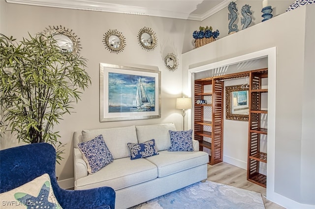 16380 Kelly Woods Dr, Fort Myers, FL 33908 - living room with ornamental molding and light hardwood / wood-style floors