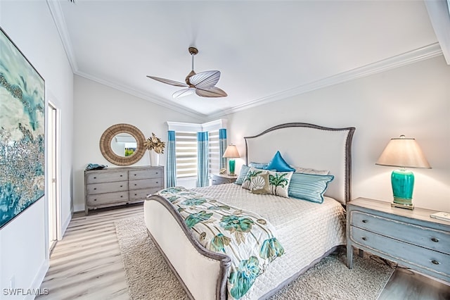 16380 Kelly Woods Dr, Fort Myers, FL 33908 - bedroom featuring crown molding, lofted ceiling, ceiling fan, and light hardwood / wood-style floors