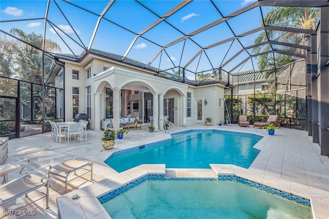 view of pool featuring an outdoor hangout area, a lanai, and a patio area