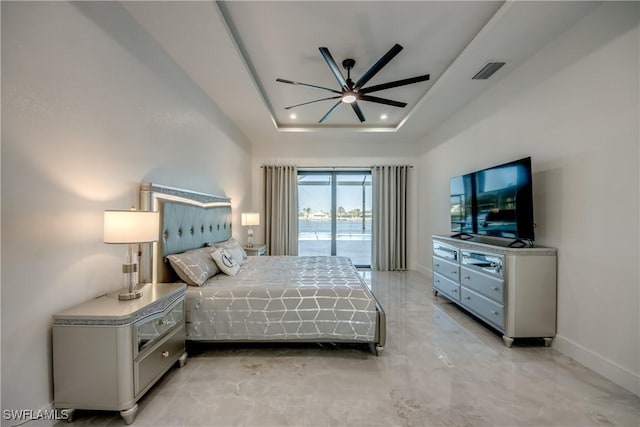 413 SW 46th Ter, Cape Coral, FL 33914 - bedroom featuring visible vents, marble finish floor, a ceiling fan, a tray ceiling, and baseboards