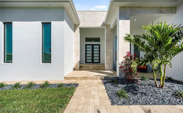413 SW 46th Ter, Cape Coral, FL 33914 - entrance to property featuring french doors and stucco siding