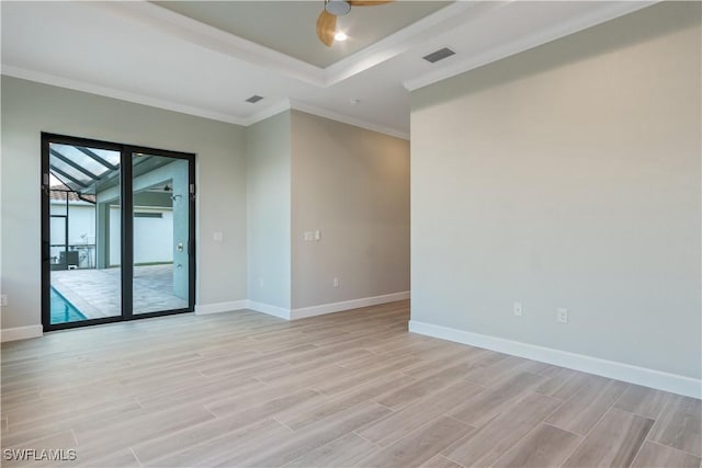 4320 Vasco St, Punta Gorda, FL 33950 - unfurnished room featuring baseboards, crown molding, visible vents, and light wood-style floors