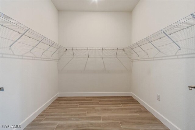 4320 Vasco St, Punta Gorda, FL 33950 - spacious closet featuring wood finished floors