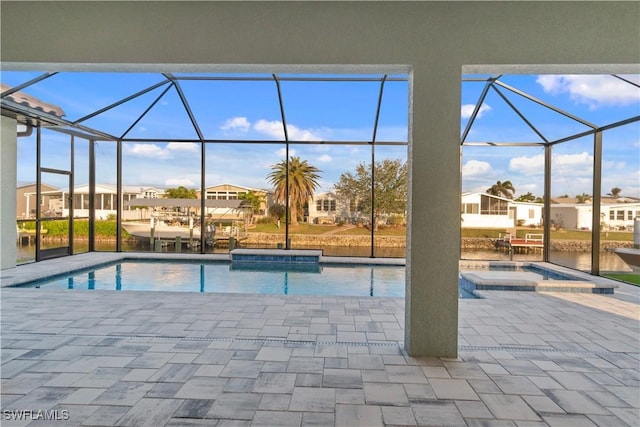 4320 Vasco St, Punta Gorda, FL 33950 - outdoor pool featuring an in ground hot tub, a patio, and glass enclosure