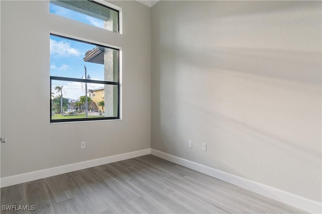 4320 Vasco St, Punta Gorda, FL 33950 - spare room with light wood-style flooring and baseboards