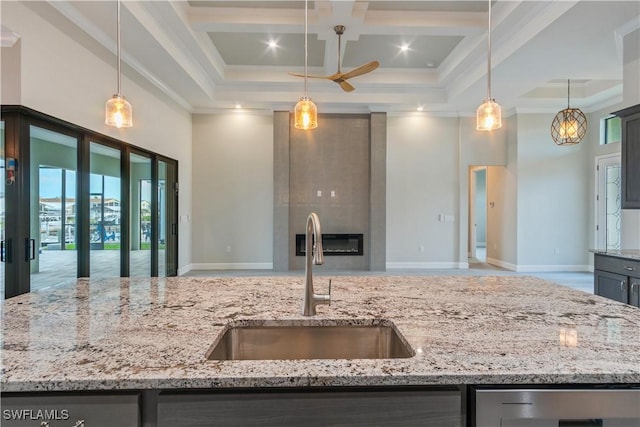 4320 Vasco St, Punta Gorda, FL 33950 - kitchen with a towering ceiling, a kitchen island with sink, pendant lighting, and a sink