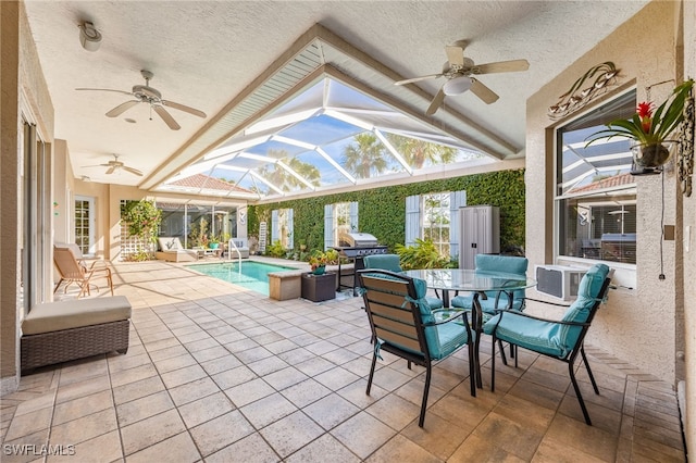 view of patio / terrace featuring ceiling fan, glass enclosure, cooling unit, an outdoor pool, and outdoor dining space