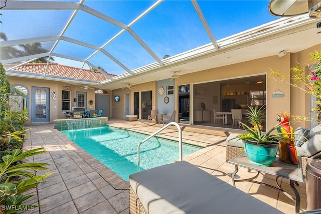 pool featuring a ceiling fan and a patio