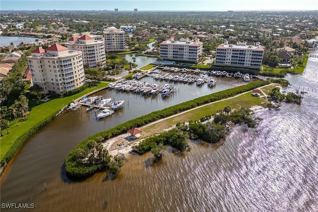 aerial view featuring a view of city and a water view