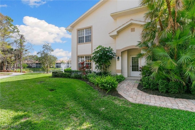 exterior space featuring a front yard