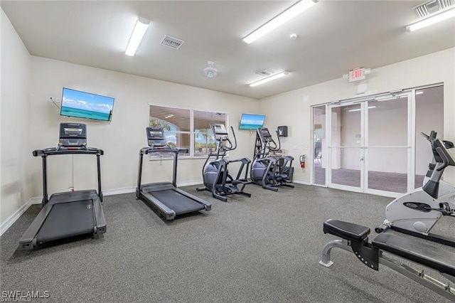 exercise room featuring french doors