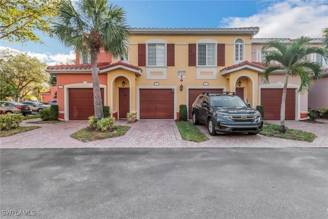 view of front of home with a garage