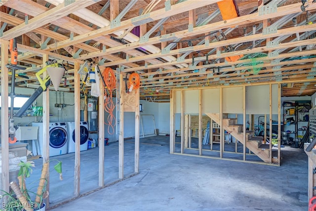 373 Hile Ln, Punta Gorda, FL 33982 - below grade area with independent washer and dryer, electric water heater, and stairway