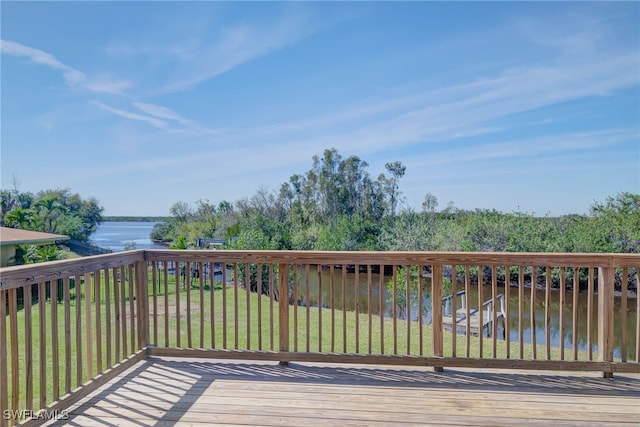 373 Hile Ln, Punta Gorda, FL 33982 - wooden terrace featuring a water view and a yard