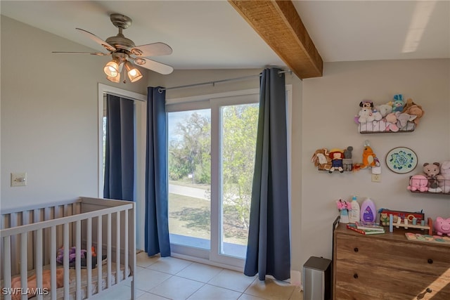 373 Hile Ln, Punta Gorda, FL 33982 - bedroom with light tile patterned flooring, a nursery area, and a ceiling fan