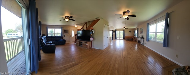 373 Hile Ln, Punta Gorda, FL 33982 - living room with a ceiling fan, plenty of natural light, wood finished floors, and baseboards