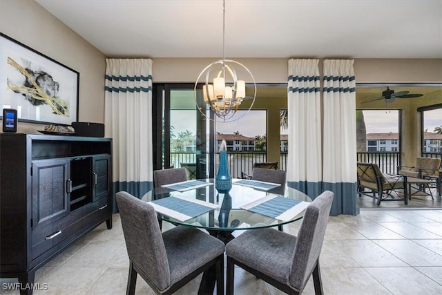 dining area with a healthy amount of sunlight and a chandelier