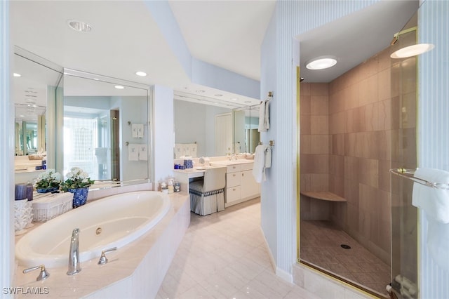 bathroom featuring vanity and plus walk in shower