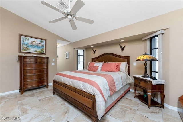 bedroom featuring vaulted ceiling and ceiling fan