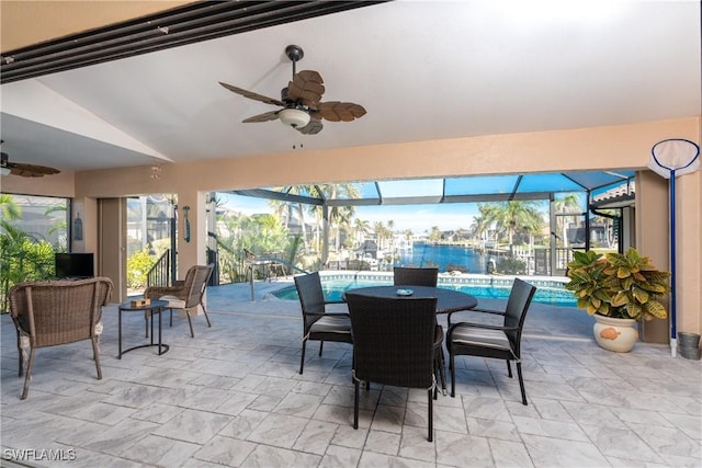 view of patio / terrace with a lanai and ceiling fan