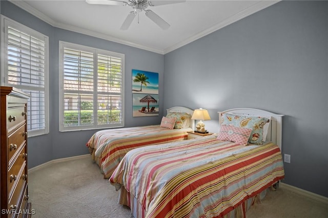 bedroom with carpet floors, ornamental molding, and baseboards
